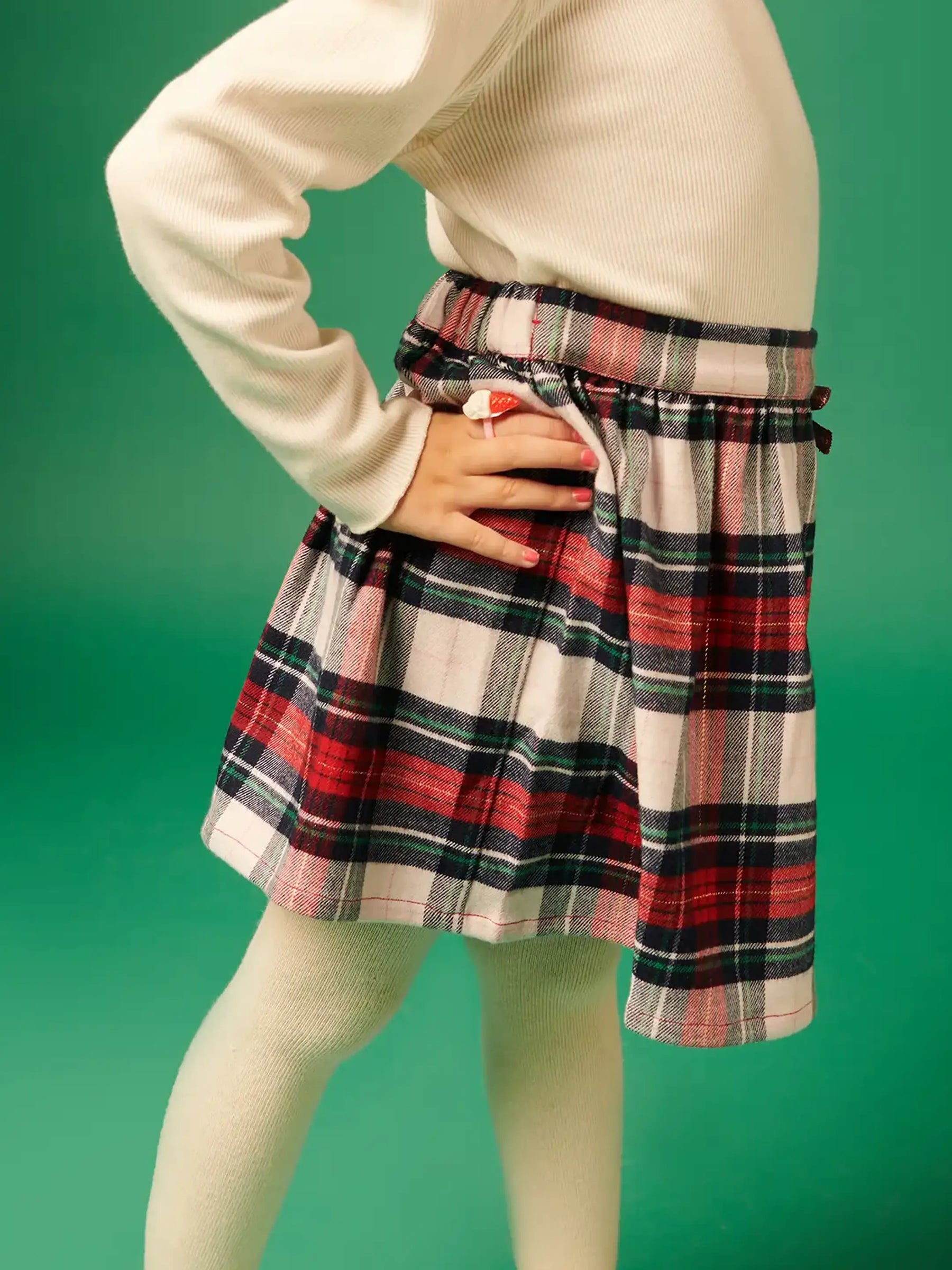 Festive Checkered Skirt Somersault